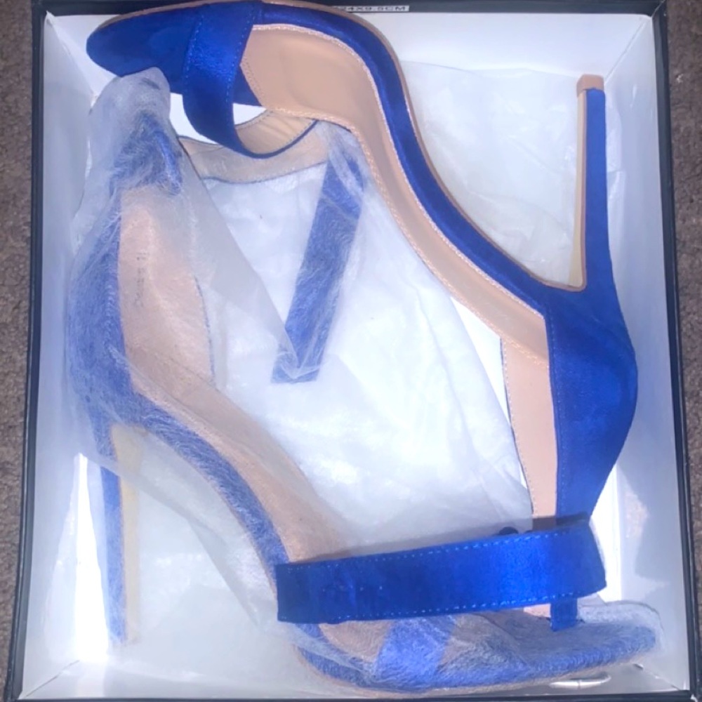 Royal blue new in the box heels.